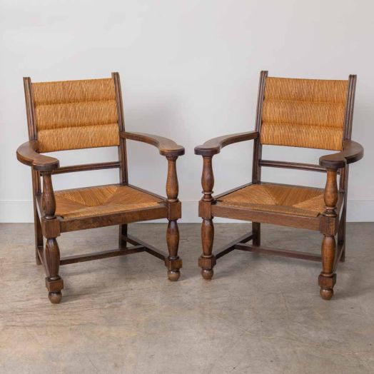 Pair of Carved Wood and Woven Chairs by Charles Dudouyt